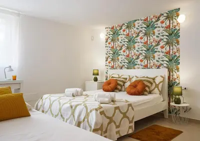Letto o letti in una camera di Salini Apartments
