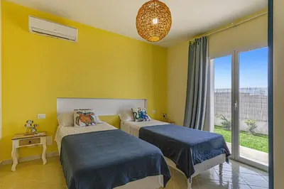 Letto o letti in una camera di Villa Gialla by Villa Plus