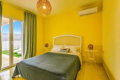 Letto o letti in una camera di Villa Gialla by Villa Plus