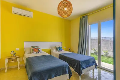 Letto o letti in una camera di Villa Gialla by Villa Plus