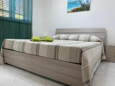 Letto o letti in una camera di VILLA LARA 600 METRI DAL MARE