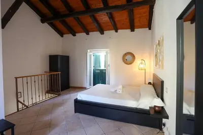 Letto o letti in una camera di Casa CaDà