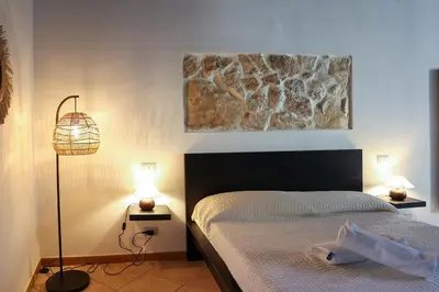 Letto o letti in una camera di Casa CaDà