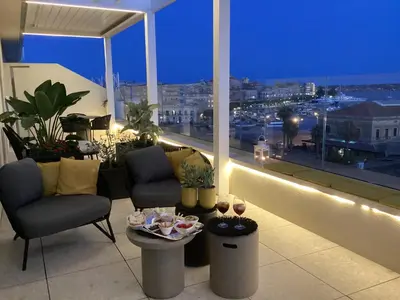 Area soggiorno di LA TERRAZZA SUL PORTO