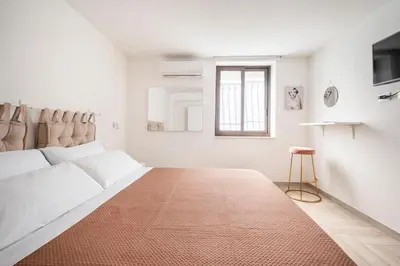 Letto o letti in una camera di Casa Vacanze MICRICO'