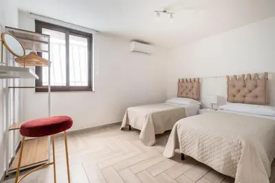 Letto o letti in una camera di Casa Vacanze MICRICO'