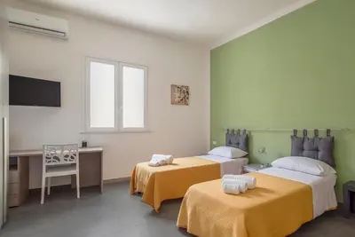 Letto o letti in una camera di Casa Salvemini
