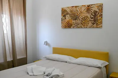 Letto o letti in una camera di GIKLA MAISON