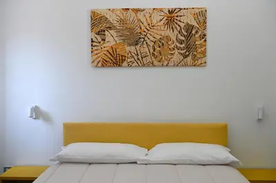 Letto o letti in una camera di GIKLA MAISON