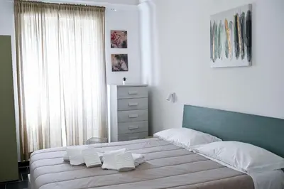 Letto o letti in una camera di GIKLA MAISON