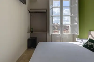 Letto o letti in una camera di Il Sovrano