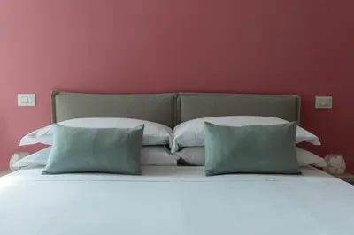 Letto o letti in una camera di Il Sovrano