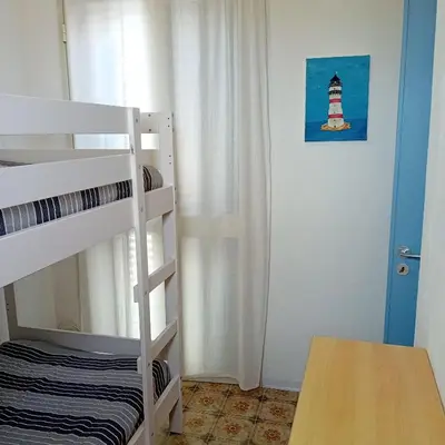 Letto o letti in una camera di Sirjaco Sea Home