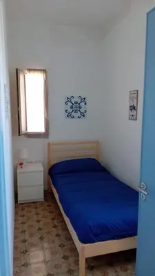 Letto o letti in una camera di Sirjaco Sea Home