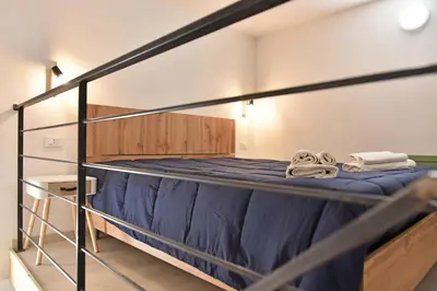 Letto o letti in una camera di La Corte di Vincenzo