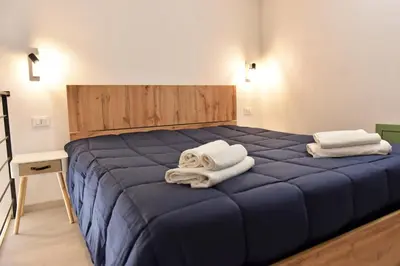 Letto o letti in una camera di La Corte di Vincenzo