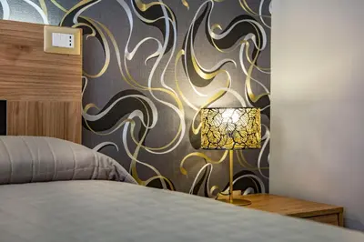 Letto o letti in una camera di B&B Altrasia