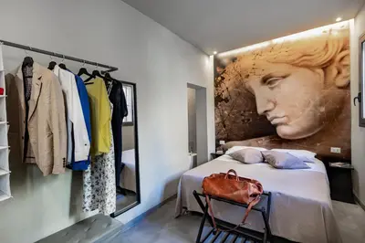 Letto o letti in una camera di Dea's Rooms