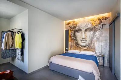 Letto o letti in una camera di Dea's Rooms