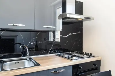 Cucina o angolo cottura di Mansarda Aurispa