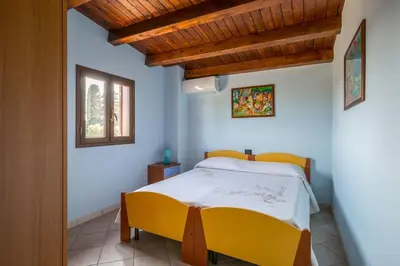 Letto o letti in una camera di Villa Stefy formula exclusive