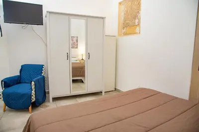 Letto o letti in una camera di Xenia Home and Selene Home 200m From Sea Apartments