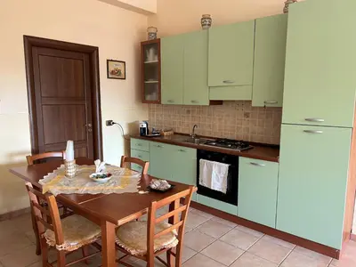 Cucina o angolo cottura di Casa Vacanze Salvatore-Relax con piscina privata