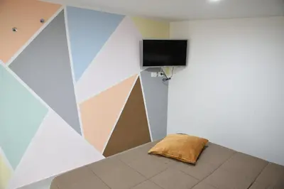 Letto o letti in una camera di La Corte di Nonno Mimmo