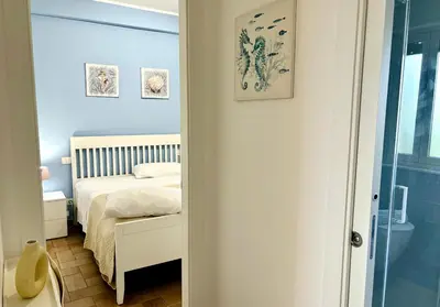 Letto o letti in una camera di La Finestra sul mare Marzamemi con Wi-Fi e posto auto