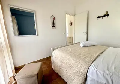 Letto o letti in una camera di La Finestra sul mare Marzamemi con Wi-Fi e posto auto