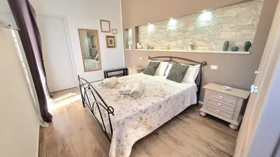 Letto o letti in una camera di Citrus Giallo