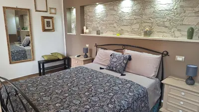 Letto o letti in una camera di Citrus Giallo