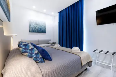 Letto o letti in una camera di Heart City Rooms