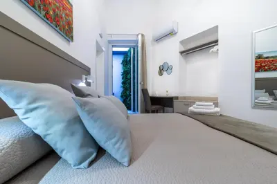 Letto o letti in una camera di Heart City Rooms