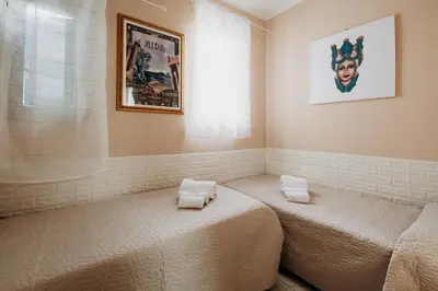 Letto o letti in una camera di Case vacanze vista mare