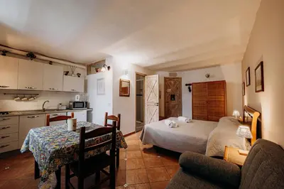 Letto o letti in una camera di Case vacanze vista mare
