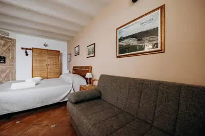 Letto o letti in una camera di Case vacanze vista mare