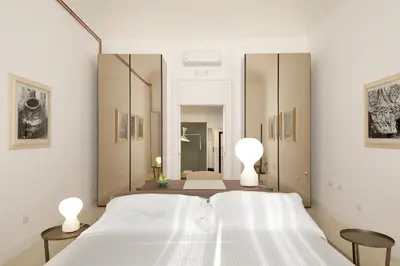 Letto o letti in una camera di L'arco di San Giuseppe