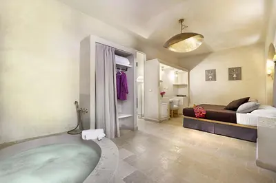 Letto o letti in una camera di Casa Vendicari Boutique Hotel