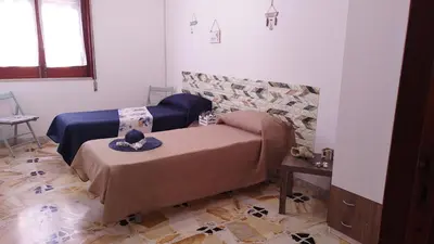 Letto o letti in una camera di S'Accomodassi - vicino al mare