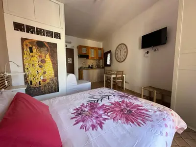Letto o letti in una camera di The Civita Apt Town Center