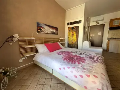 Letto o letti in una camera di The Civita Apt Town Center