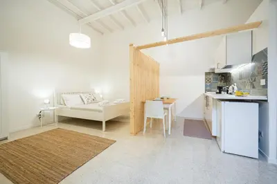 Letto o letti in una camera di Cortile Santa Teresa