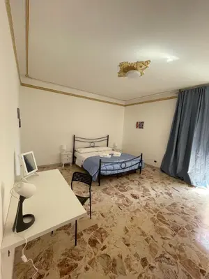 Letto o letti in una camera di L&L Home - Augusta - Siracusa