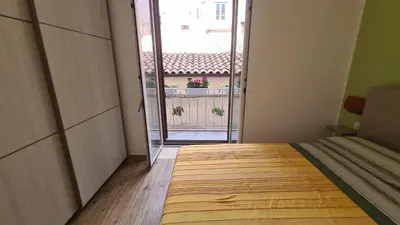 Letto o letti in una camera di Casa Daphne di Ortigia