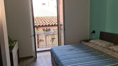 Letto o letti in una camera di Casa Daphne di Ortigia