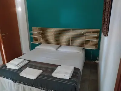 Letto o letti in una camera di Villa delle palme