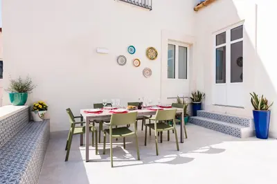 Area soggiorno di 2 Soru Ortigia Holiday Home - Attico con terrazza