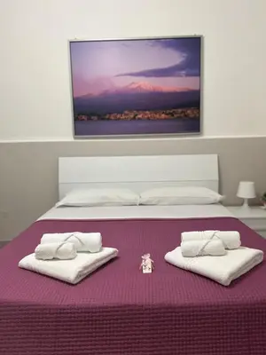 Letto o letti in una camera di Apartments for rent Catania