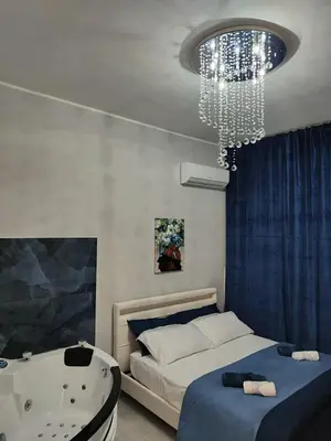Letto o letti in una camera di Apartments for rent Catania